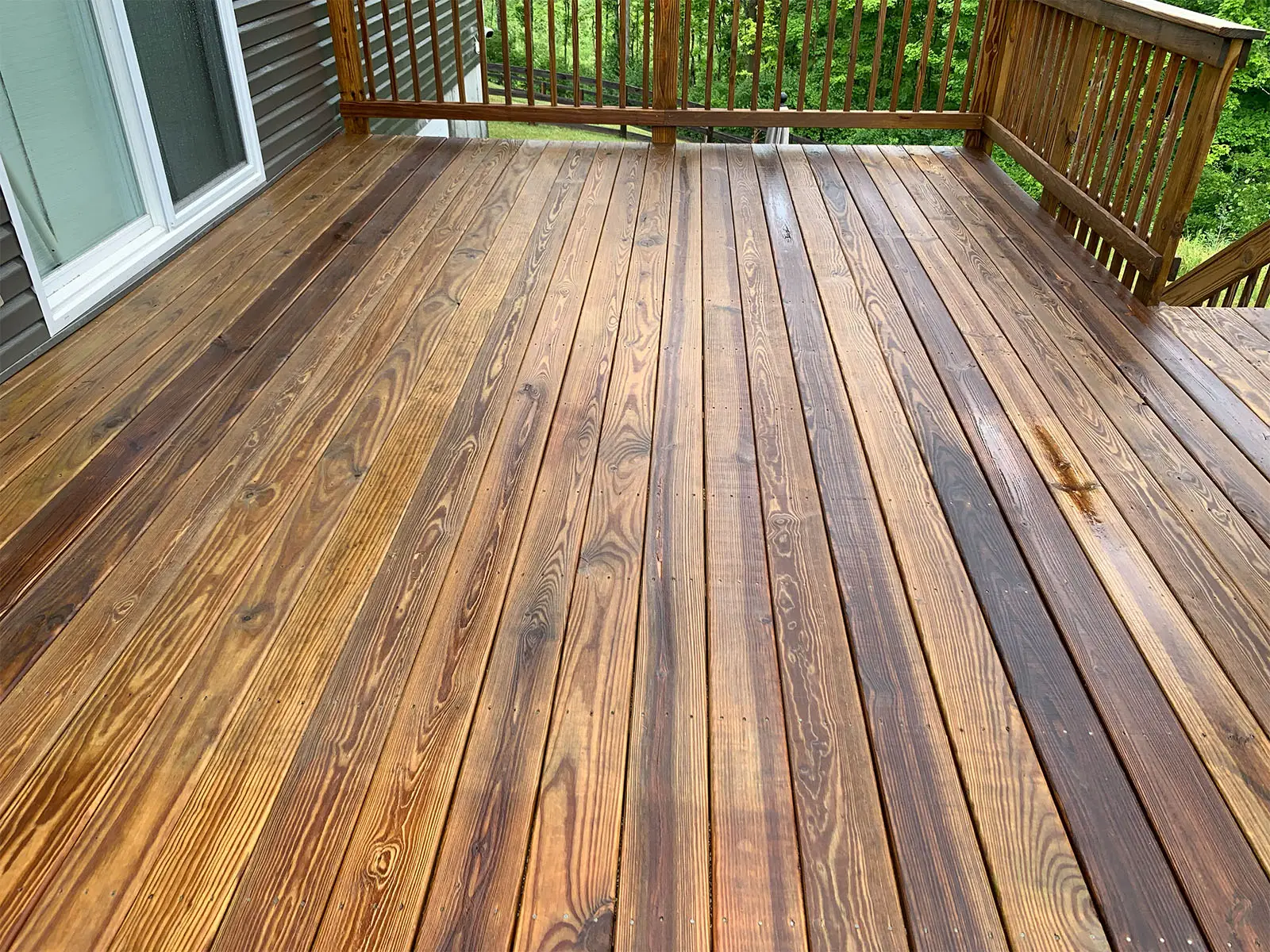 Deck Cleaning in Newport, KY Deck cleaning results - restored wood deck by Liberty Power Wash