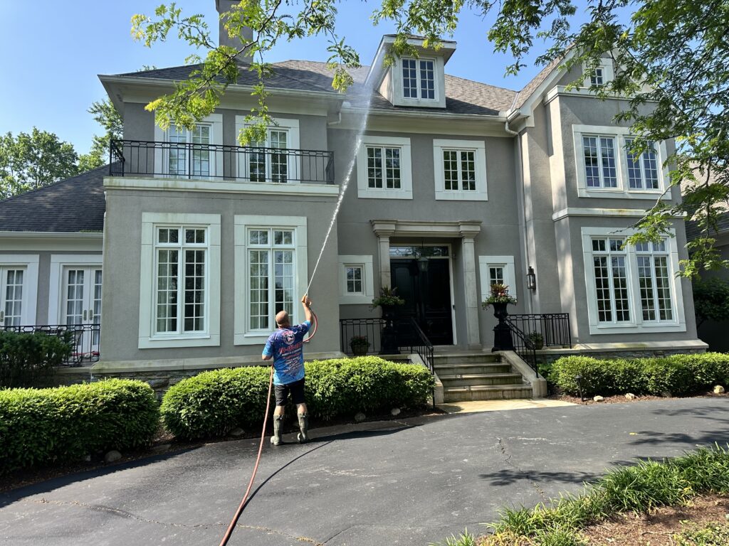 Power washing the side of a house| Liberty Power Wash