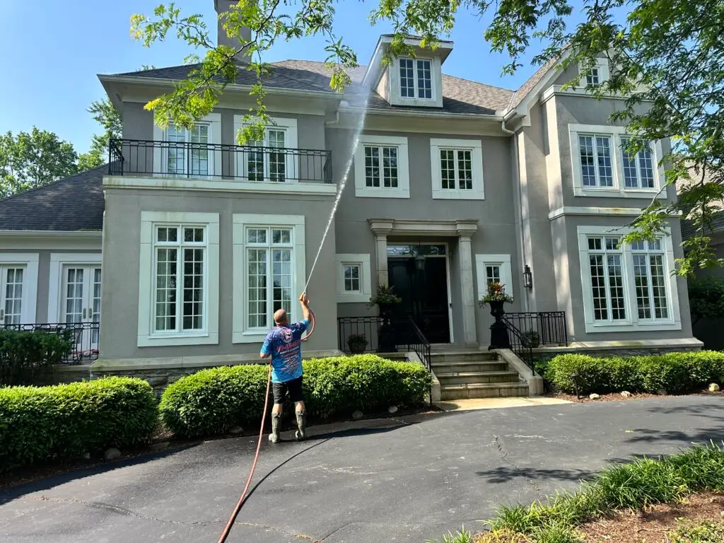 Fall Power Washing in Northern Kentucky: The Homeowner’s Seasonal Guide Power washing the side of a house| Liberty Power Wash