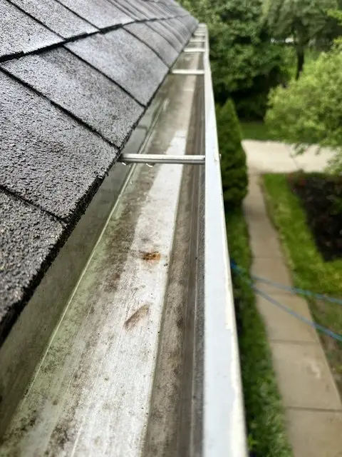 Gutter Cleaning Spotless clean gutter after professional gutter cleaning in Blue Ash, OH