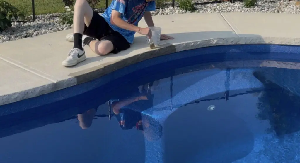 Hand sealing pool deck coping in Milford, OH