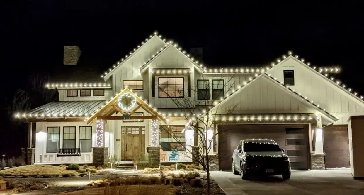 Christmas Light Installation in Villa Hills, KY Christmas roofline lights and a wreath on a craftsman-style home in Villa Hills, KY