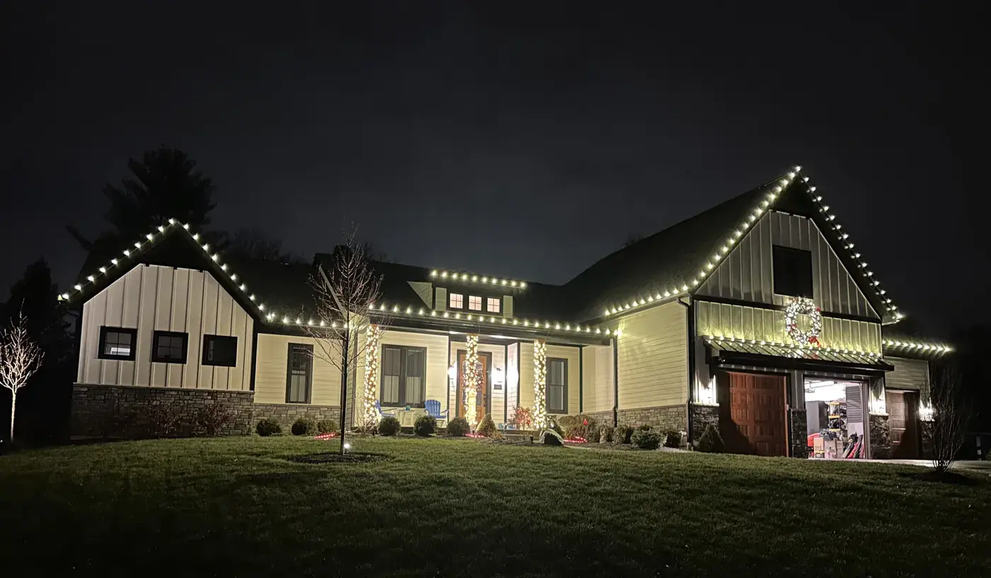 Christmas Light Installation in Liberty Township, OH Christmas roofline lights on a modern farmhouse-style home