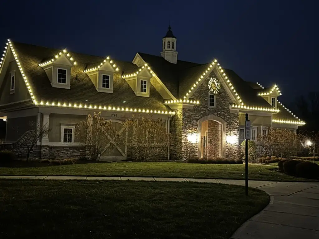 Christmas Lighting Commercial Christmas light installation on a clubhouse roofline