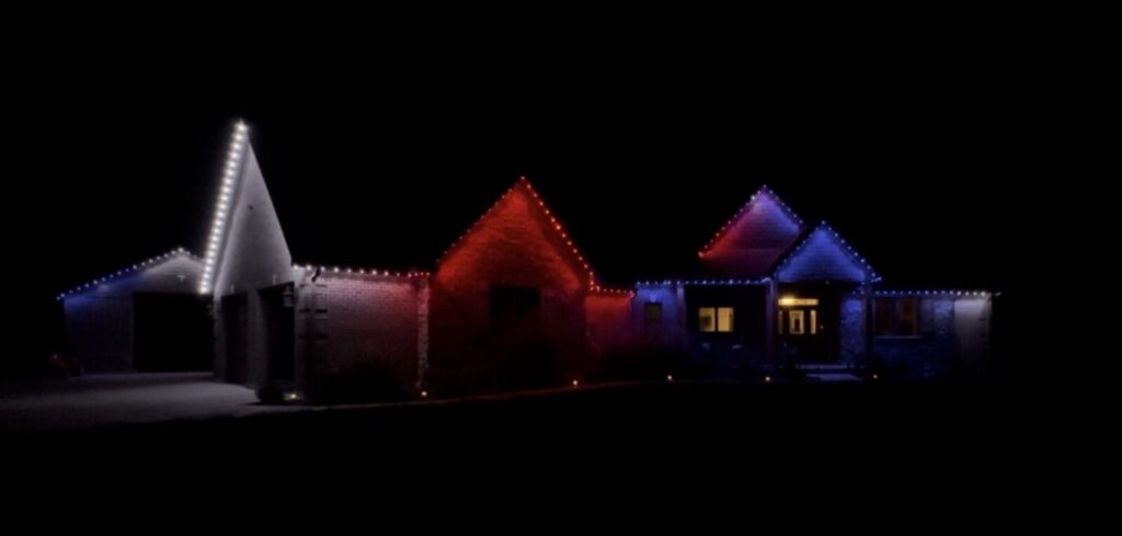 Christmas Lighting Permanent LED lighting running a multi-color moving pattern on a home in Hebron, KY