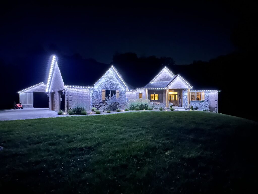 Christmas Lighting Permanent LED lighting set to pure white on a home in Cincinnati